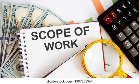 Word Writing SCOPE OF WORK . Business Concept With Chart, Dollars And Office Tools