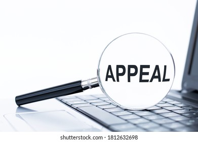 Word Writing Text Appeal On A Magnifying Glass. Business Concept For An Application To A Higher Court For A Decision To Be Reversed.