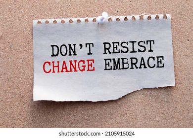 Word writing text Don T Resist Change Embrace It. Business concept for Be open to changes try new things positive Colored clipboard blank paper sheet old retro wooden vintage background.