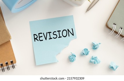 Word Writing Text Revision. Business Concept For Action Of Revising Over Someone On The Table.