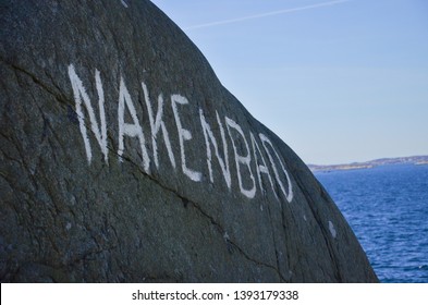 Word written on a mountain in the Swedish archipelago, Translation: Skinny dipping