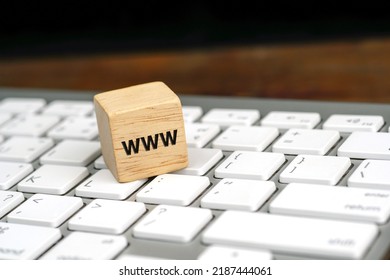 Word Www, World Wide Web Written On Wooden Block On White Computer Keyboard. Online Communication Or Web Browsing Concept.                    