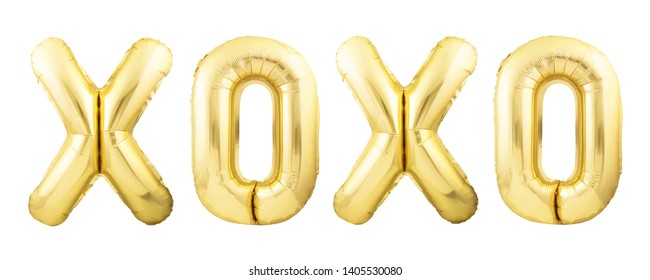 Word XOXO For Hugs And Kisses Made Of Golden Inflatable Balloon Letters Isolated On White Background. Helium Balloons Forming Word XOXO