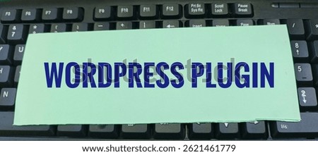 WordPress Plugin Concept Written on White Paper Sheet Placed on Computer Keyboard – Software Development and Website Optimization Idea. 