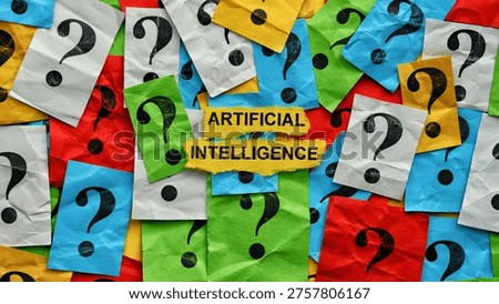 The words Artificial Intelligence on torn yellow paper surrounded by colorful crumpled notes with question marks on them. Close up.