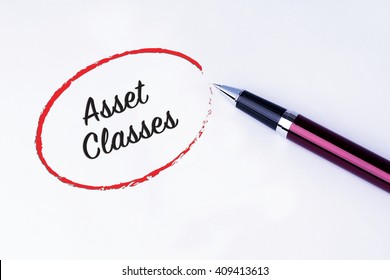 The Words Asset Classes Written In A Red Circle With A Pen On Isolated White Background. Types Of Investment And Business Concept.