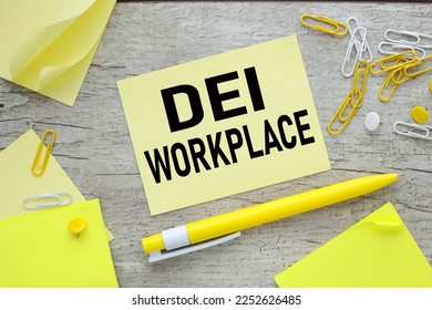 words DEI workplace text on yellow sticker. yellow pen. Business DEI diversity equity inclusion . Copy space. - Shutterstock ID 2252626485