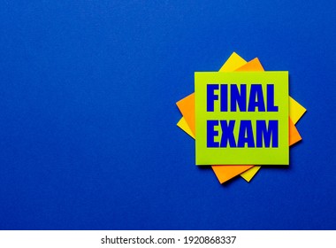 The Words FINAL EXAM Is Written On Bright Stickers On A Blue Background