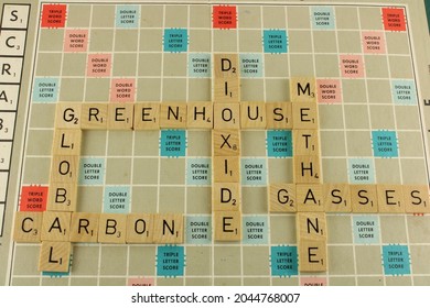 The Words Greenhouse Gasses On A Scrabble Board. Global Warming Concept. Lancashire, UK, 21-0-92021