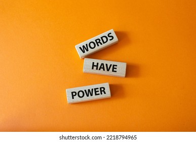 Words have power symbol. Wooden blocks with words Words have power. Beautiful orange background. Business and Words have power concept. Copy space.