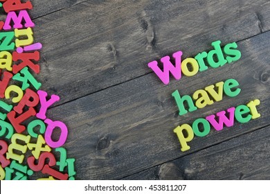 Words have power word on wooden table