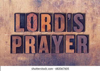 The words Lord's Prayer concept and theme written in vintage wooden letterpress type on a grunge background. - Shutterstock ID 682067605