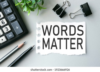 Words Matter. Text On White Paper On Gray Background