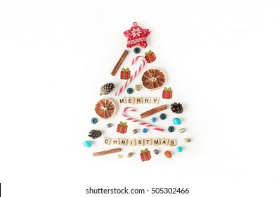 Words Merry Christmas And Christmas Tree Made Of Decor And Accessories. Flat Lay, Top View