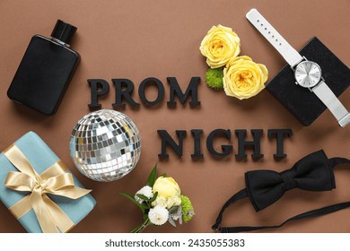 Words PROM NIGHT with bow tie, gift box and perfume bottle on brown background
