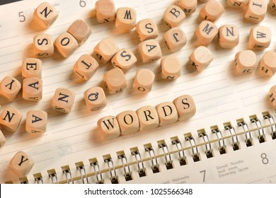 Words word on wooden cubes. Words concept - Shutterstock ID 1025566348