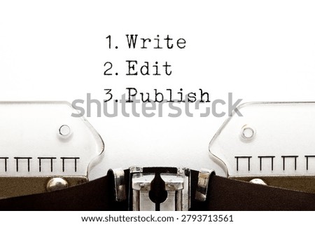 Words Write, Edit, Publish written on vintage typewriter. 