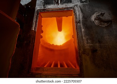 Work area of rotating lime burning kiln with burning flame - Shutterstock ID 2225705507