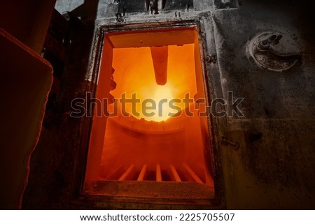 Work area of rotating lime burning kiln with burning flame