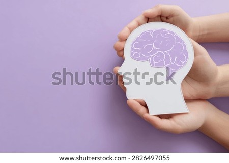 Work Brain Concept. Paper Cut Head Silhouette on Purple Background.