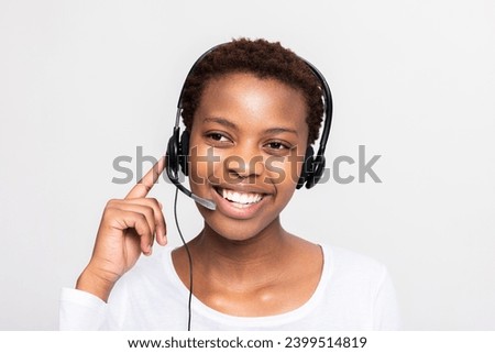 Work at call centre operator over white background in studio receiving call with customers clients smiling supporting giving advice solving problems.
