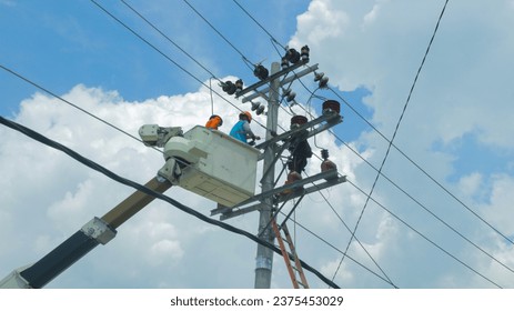 The work of cleaning high voltage electrical insulators was carried out by two skilled electrical workers