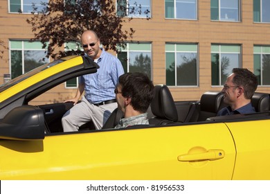 Work Colleagues Car Pooling From The Office