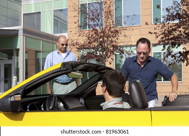 Work Colleagues Car Pooling From The Office