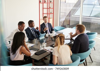 Work Colleagues Having A Meeting In Boardroom