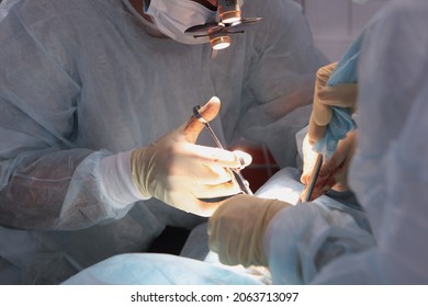 The Work Of Dentists In The Operating Room. Modern Dentistry. Installation Of Implants. Extraction Of Teeth Under General Anesthesia.