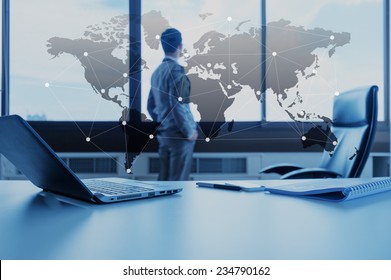 work desk of businessman with laptop, globalization business concept - Powered by Shutterstock