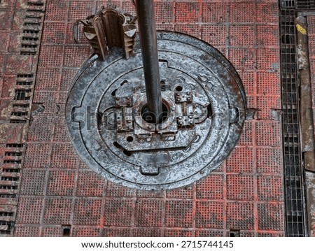 Work the drill string up and down with rotation in order to clean the well before pulling out of the hole - drilling rig actvity