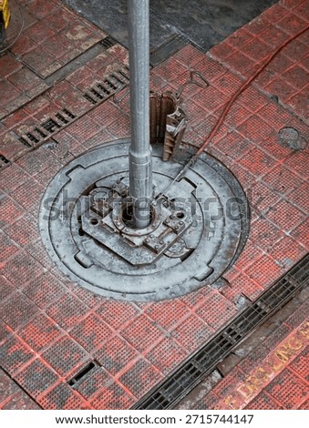 Work the drill string up and down with rotation in order to clean the well before pulling out of the hole - drilling rig actvity