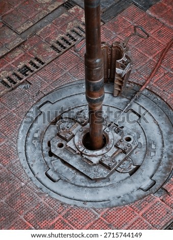 Work the drill string up and down with rotation in order to clean the well before pulling out of the hole - drilling rig actvity