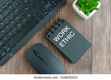 Work Ethic Text On Note Pad On Top Of Desk Flat Lay