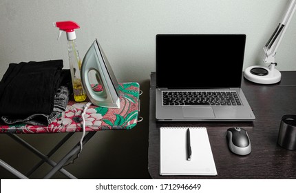 Work Home Balance Problem Concept. Workplace Desk Laptop Coffee Mug Notepad Separated From Household Chores Danger Iron On Board Washing. Success Woman Career Or Family