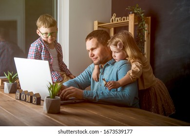 Work From Home. It Developer Work On Laptop With Children.