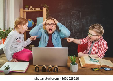 Work From Home. Man In Stress Works On Laptop With Children Playing Around. Family Together During Quarantine.