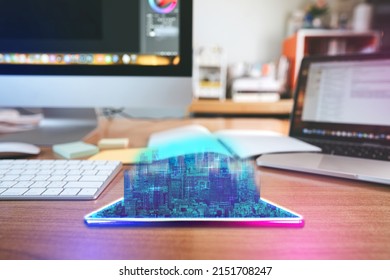 Work from home with metaverse technology concept. Workplace desk with digital visual hologram neon city. Computer monitor and laptop background in office. - Powered by Shutterstock - Get 15% off with code: PIKWIZARD15