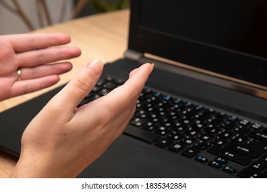 work at the laptop. hands and laptop