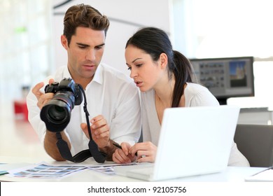 Work meeting in photo agency - Powered by Shutterstock