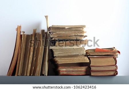work object old books and fork and corkscrew