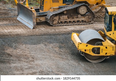 Work On A New Road With Earthmoving Machinery