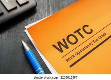 Work Opportunity Tax Credit WOTC Application, Pen And A Notepad.