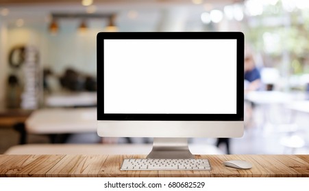 Work place concept : Mock up Blank screen computer desktop with keyboard in cafe or co-working background.