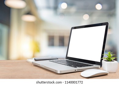 Work Place Concept Mockup Blank Screen Laptop On Desk. Workspace With Laptop And Office Supplies