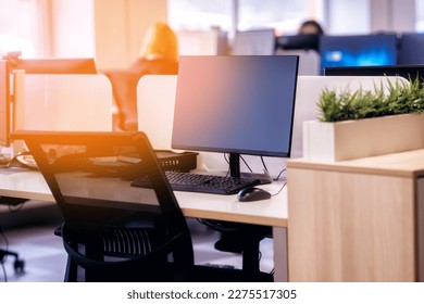 Work place concept. Screen computer desktop with keyboard in office or co-working background.