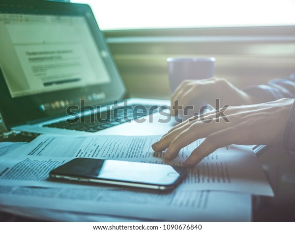 work place on the table in the train, travel\
concept with laptop