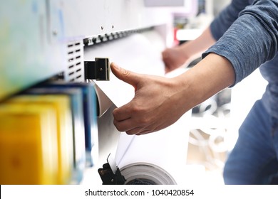 Work in the printing house.
The printer works on a plotter.
 - Shutterstock ID 1040420854