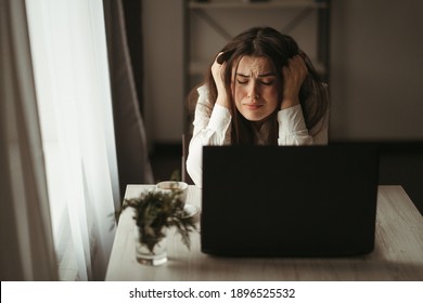 Work Problem. Routine. Lack Of Sleep. Overworking. Fatigue. Project Failure. Boring Virtual Meeting. Sad Tired Sleepy Woman Sitting At The Table In Her Home Office